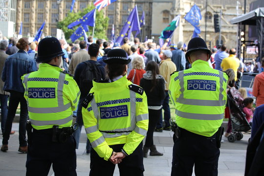 Police observe an anti-Brexit Remain rally at Westminster, UK