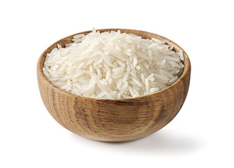 Fototapeta Dry white long rice basmati in wooden bowl isolated on a white background. obraz