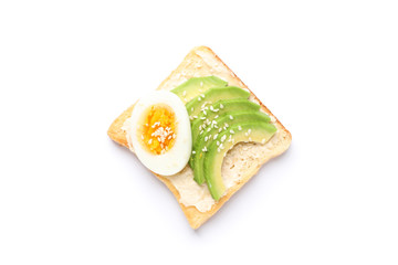Toast with avocado and egg isolated on white background