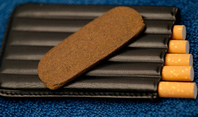 Medical Hashis in the Kingdom of Morocco - CBD medical Moroccan cannabis hashish piece on top of...