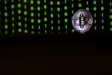 bitcoin coin on black background with copy space