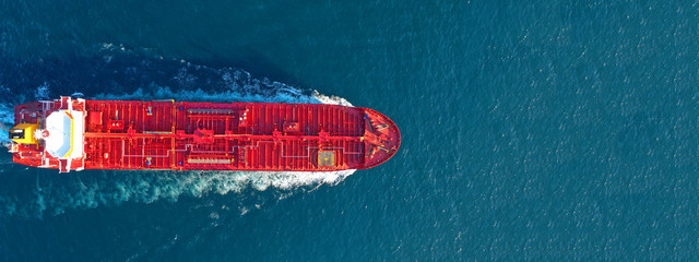 Aerial drone ultra wide panoramic photo of industrial fuel and petrochemical tanker cruising open...