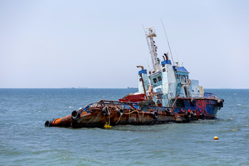 Abandoned cargo ship in the sea