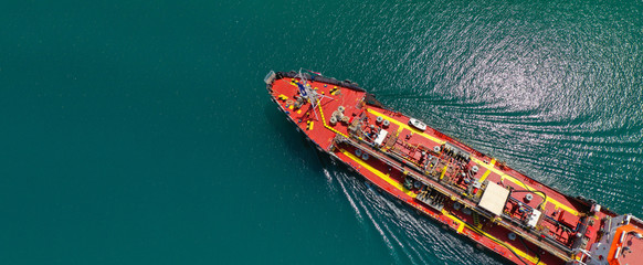 Aerial drone ultra wide panoramic photo of industrial fuel and petrochemical tanker cruising open...