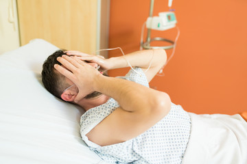 Worried Patient Suffering From Disease At Hospital