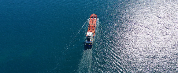 Aerial drone ultra wide panoramic photo of industrial fuel and petrochemical tanker cruising open...