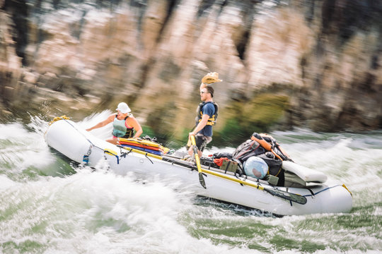People on a raft in Specter Rapid, Colorado River, Grand Canyon National Park, Arizona, USA