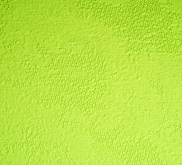 Fototapeta premium Textured surface structure of pistachio, green, yellow.