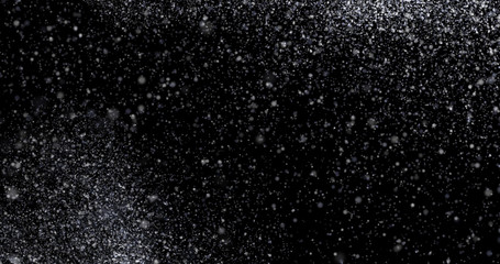 Obraz premium Natural white winter snowfall on a black background