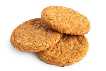 Three crunchy oat and wholemeal biscuits isolated on white.