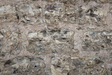 Wall built with stone and cement mortar or lime