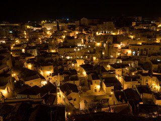 Italy, april 2019: Sassi is an ancient district of Matera by night, landscape by night, night lights