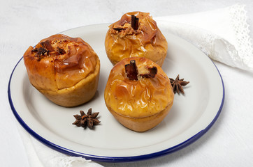 Homemade roasted apples on white background