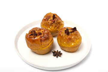 Homemade roasted apples on white background