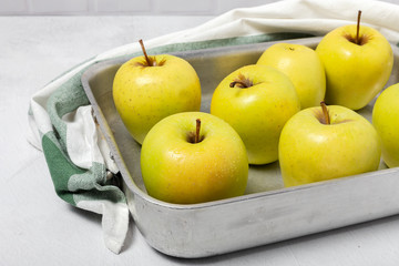 Fresh green apples on white background