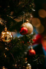 Beautiful Christmas tree with decor against blurred lights on background