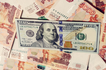 American hundred dollars on the background of Russian 5000 rubles. 2019
