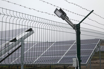Sunlight gleams off solar panel. Solar panel produces green, environmentally friendly energy from the sun.