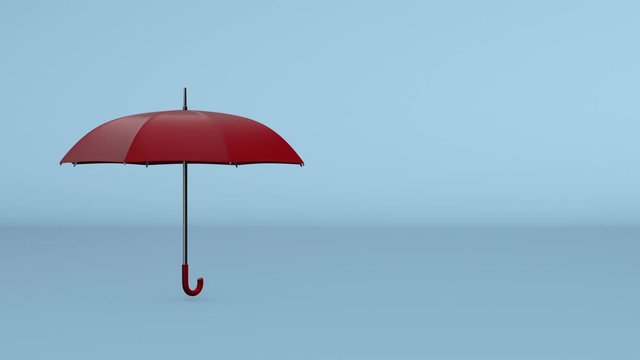 A red umbrella spinning, concept of protection, copy space, seamless loop (3d render)