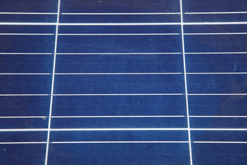 Sunlight gleams off solar panel. Solar panel produces green, environmentally friendly energy from the sun.