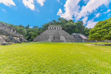 Ancient Mayan ruins in Palenque, Chiapas, Mexico. Mayan ruins in the middle of the jungle on a...