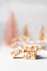 almond nougat closeup with bokeh christmas