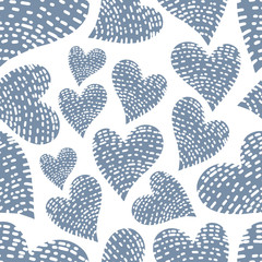 Romantic seamless pattern with cute images of hearts with hand drawn texture. The style of children's drawing.