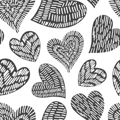 Romantic seamless pattern with cute images of hearts with hand drawn texture. The style of children's drawing.