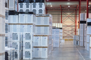 Floor storage of household appliances in a warehouse in several layers