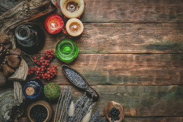 Magic potion on the wizard flat lay table background with copy space. Witchcraft, witch doctor concept.