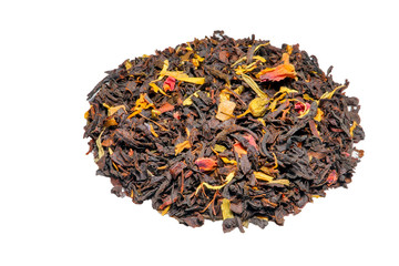 black tea with fruit pieces and flower petals macro isolate