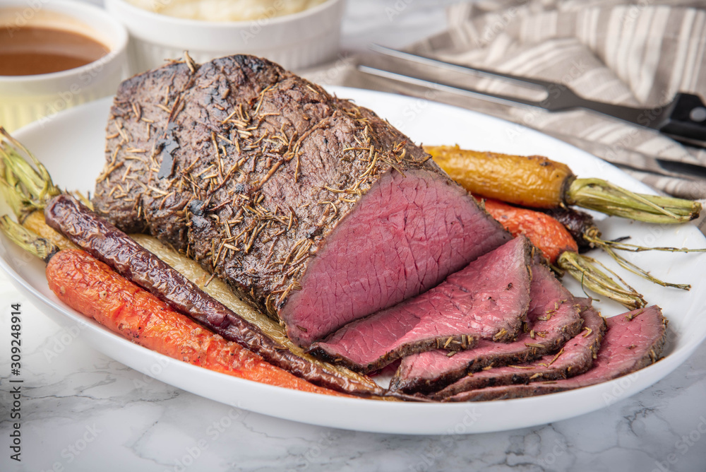 Wall mural top round roast beef with carrot and mushed potato