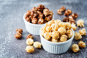 Caramel and chocolate sweet Popcorn in a white bowl