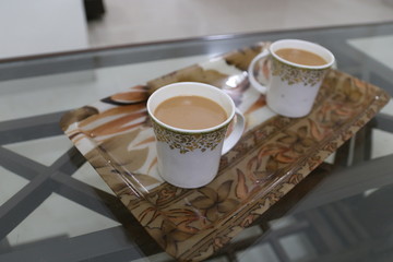 Traditional morning feed of Indian tea in the hotel