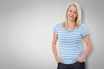 Friendly smiling middle-aged woman isolated on white background