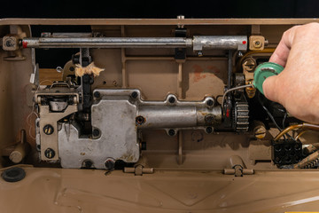 Cleaning and lubrication of the mechanism of the sewing machine.