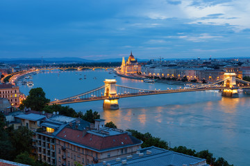 Fototapeta na wymiar Sunset Budapest along Danube with Chain Bridge and Parliament Building