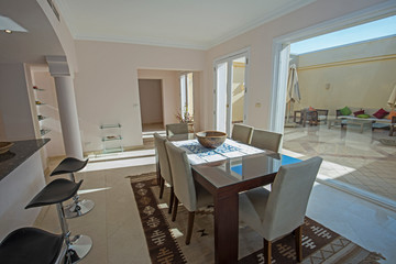 Interior design of luxury villa open plan dining area