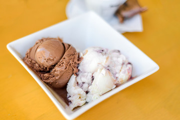 Chocolate and white cream ice cream . Restaurant dessert