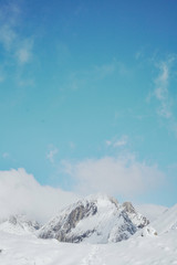 Snow White Glacier Mountains with Brilliant Blue Sky