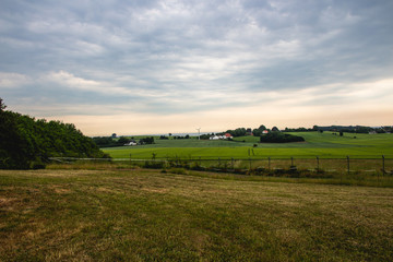 Landscape with field and blue sky