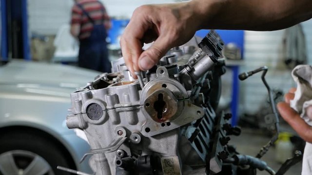 repair of a removed engine from a car