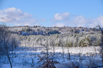 Fototapeta na wymiar leominster hospital gainst a snowy landscape