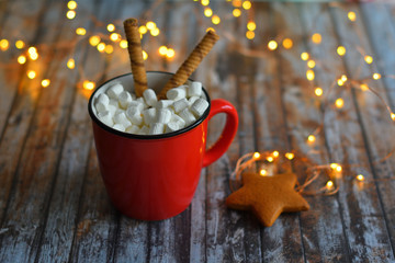 Christmas composition. Coffee cup and Christmas decorations on wooden background. Merry Christmas and Happy new Year