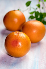 Bloody orange (Citrus sinensis) on a wooden table