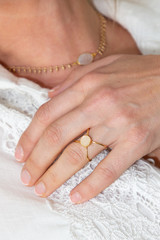 woman hand with jewellery rings and necklace fashion style
