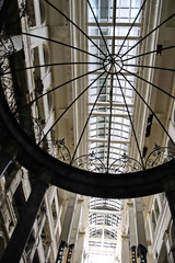 Rotunda in the main hall with elevators of a dilapidated abandoned hotel