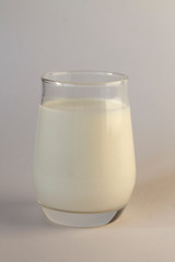 healthy food: a glass of milk on a white background
