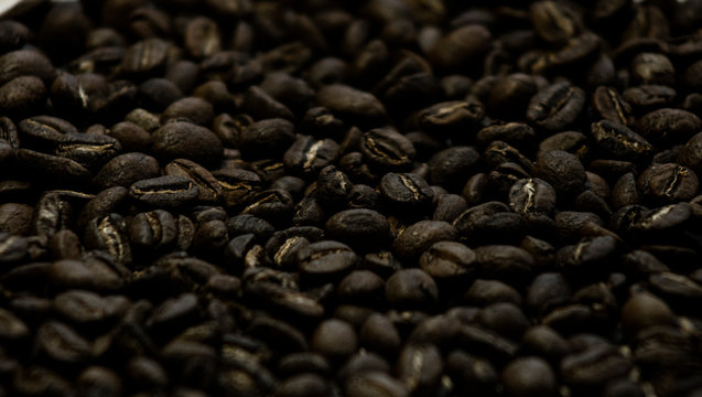 Soft image of roasted brown coffee beans.
