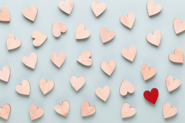 Happy Valentines day background. red hearts on white wooden background.